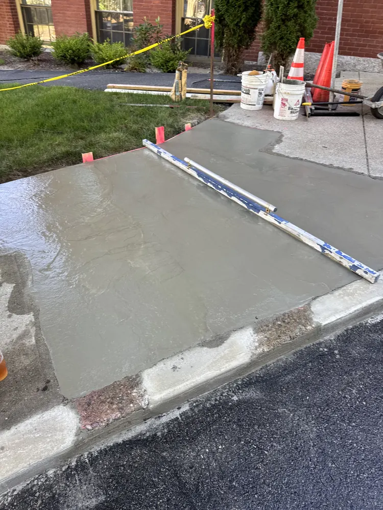 Fresh concrete sidewalk and curb section