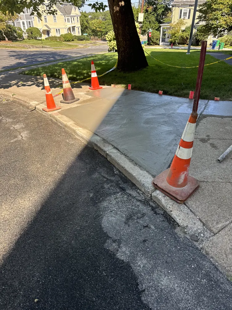 Concrete curb repair work zone