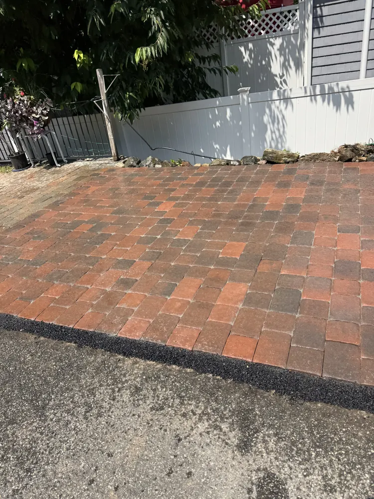 Completed brick paver driveway apron