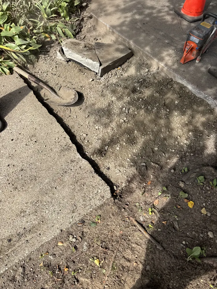 Excavation beside an existing walkway